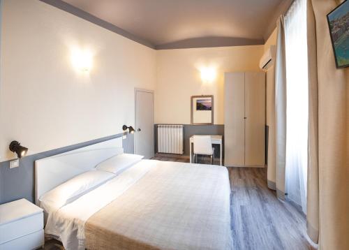 Albergo La Villettaにあるベッド