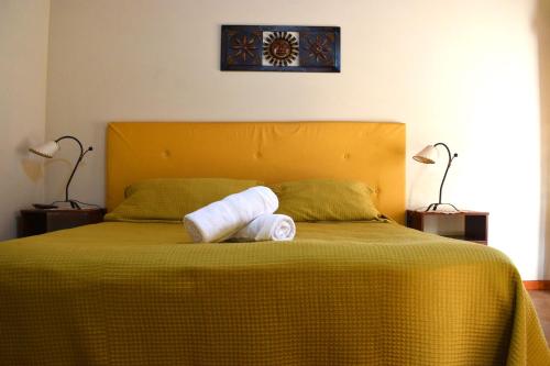 A bed or beds in a room at El Rincón de Iri-Nan