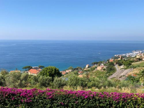 a view from the top of a balcony overlooking the ocean at La Casa Di Sissi B&B in Sanremo