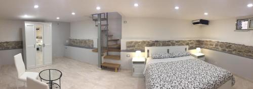 フォンディにあるCentral Holiday Home Fondiのベッドルーム1室(ベッド1台付)が備わります。