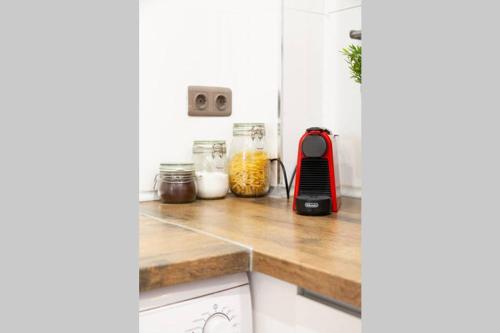 a kitchen with a counter with food ingredients at Appartement ALFONSO in Salou