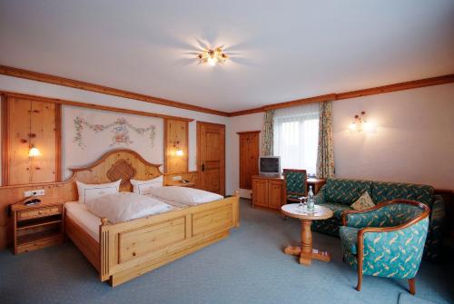 Giường trong phòng chung tại Hotel Gasthof Jägerhaus