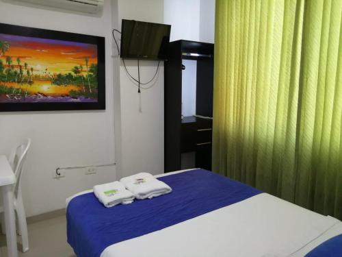 Hotel Azulejo del Llanoにあるベッド