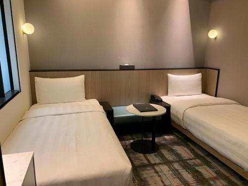 Katil atau katil-katil dalam bilik di Hotel Midtown Richardson
