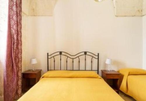 Postelja oz. postelje v sobi nastanitve Appartamento Il Barco