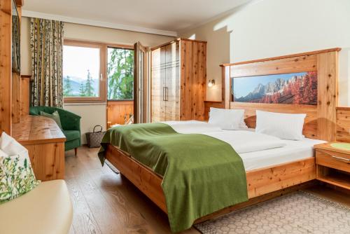 Krevet ili kreveti u jedinici u okviru objekta Aparthotel Ramsau