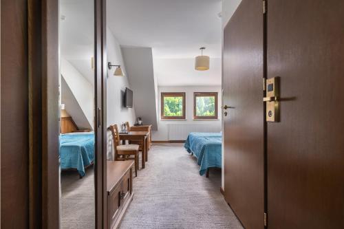 Katil atau katil-katil dalam bilik di Ostrzyce Spa