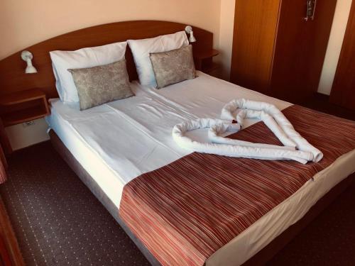 Family Hotel Deja Vuにあるベッド
