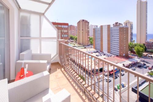 an apartment balcony with a view of a city at My Pretty Payma Apartamentos in Benidorm