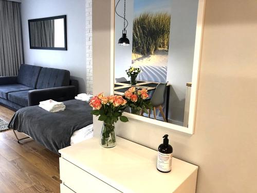 Posteľ alebo postele v izbe v ubytovaní Apartament Na Mierzei - SALA ZABAW, SIŁOWNIA - 365PAM