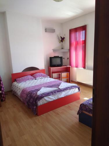 Katil atau katil-katil dalam bilik di Guest House - Batak