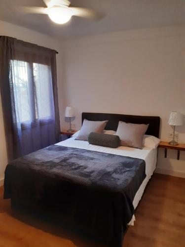Postel nebo postele na pokoji v ubytování Moderno apartamento con vista a la montaña