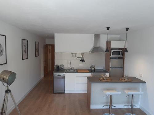 Kuchyň nebo kuchyňský kout v ubytování Moderno apartamento con vista a la montaña