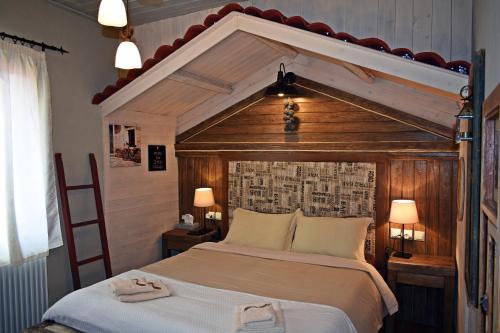 Кровать или кровати в номере Agiaz'