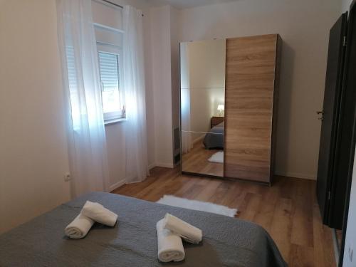 Krevet ili kreveti u jedinici u objektu Apartman Bella 2