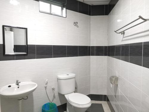 Koupelna v ubytování LH Hotel Langkap Perak