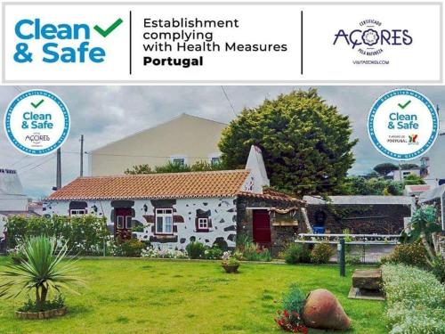 アングラ・ド・エロイーズモにあるFisherman's House Azoresのきれい安全なロゴ入りの家の写真