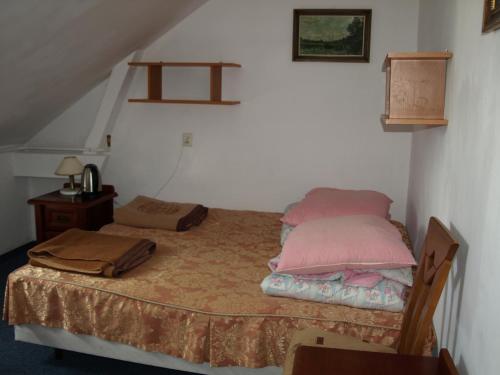 Łóżko lub łóżka w pokoju w obiekcie D.W. Grażyna