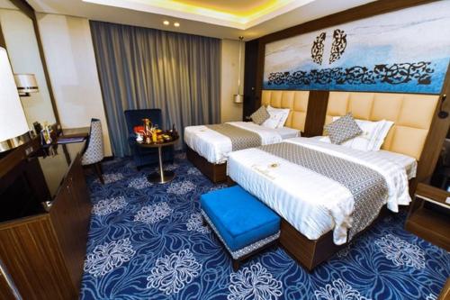 Katil atau katil-katil dalam bilik di Casablanca Hotel Jeddah