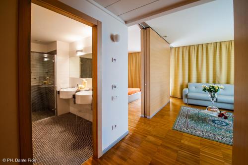 Ένα ή περισσότερα κρεβάτια σε δωμάτιο στο Residence SchioHotel