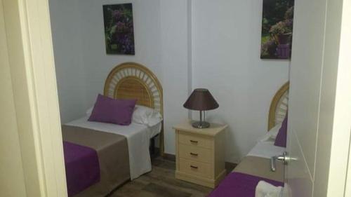 A bed or beds in a room at Apartamento en Las Marinas Vera