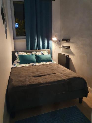 Łóżko lub łóżka w pokoju w obiekcie Monte Gdynia Apartament