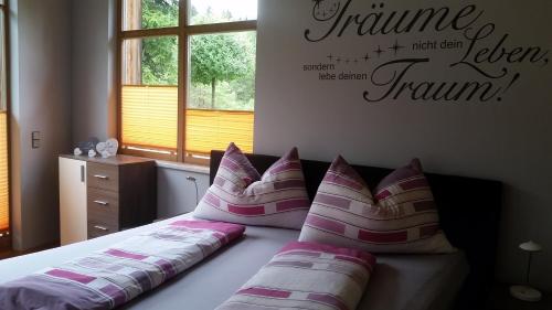 Postel nebo postele na pokoji v ubytování Ferienwohnung Bettina