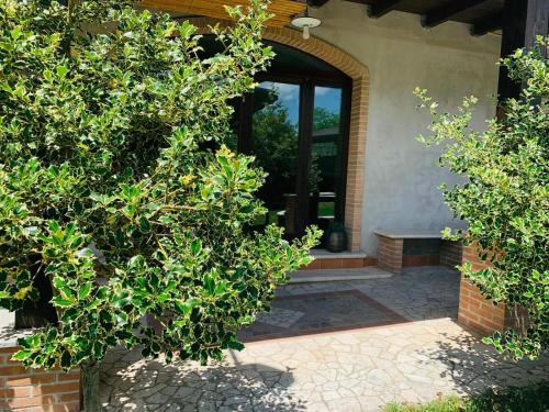 an entrance to a house with a glass door at La collina su Ascoli in Ascoli Piceno