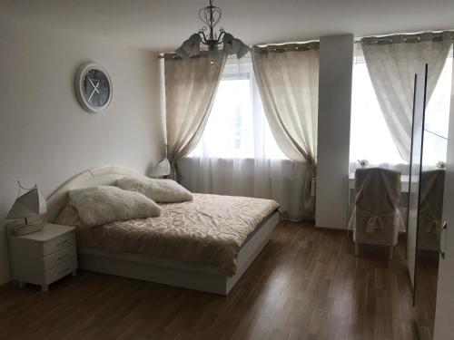 Postel nebo postele na pokoji v ubytování Jura Apartaments