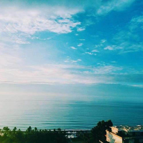 a view of the ocean with a blue sky at Dreamland Oasis of happiness in Chakvi
