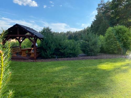 a gazebo in the middle of a lawn at Nad Wiartlem in Wiartel