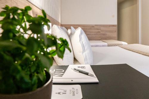 Postel nebo postele na pokoji v ubytování Hotel Park