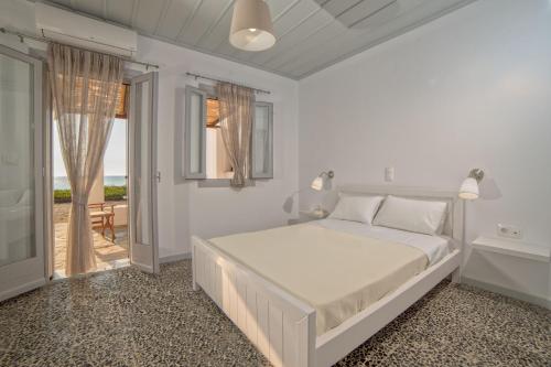 En eller flere senge i et værelse på Aktaia