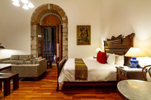 Ein Bett oder Betten in einem Zimmer der Unterkunft Hotel Los Juaninos