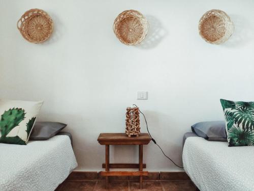 Posteľ alebo postele v izbe v ubytovaní Casas Blancas -Suites 2y3- R E L A X