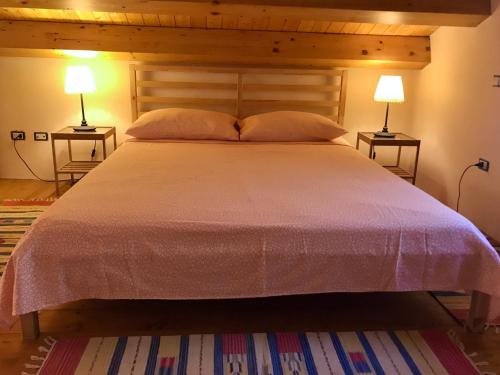 Кровать или кровати в номере VentodiMilazzo - Studio Loft