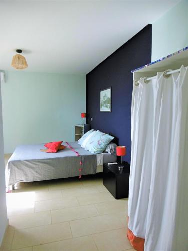 Llit o llits en una habitació de Mango Trees