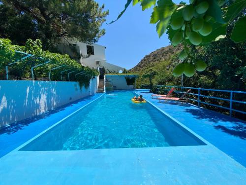 Swimming pool sa o malapit sa Oleander's Garden Traditional Cretan Cottage