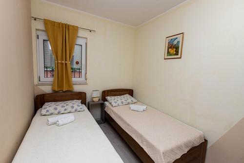 Postel nebo postele na pokoji v ubytování Villa Martin