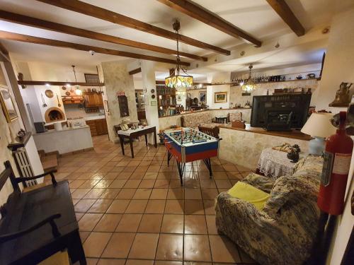 a living room with a couch and a table at B&B Del Maresciallo in Leporano