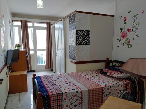 Postel nebo postele na pokoji v ubytování Orient Guesthouse Auberge
