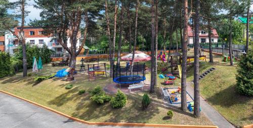 an aerial view of a playground in a park at Dom Wypoczynkowy Leśna Perła in Jastrzębia Góra