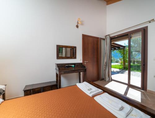 Katil atau katil-katil dalam bilik di Melissi Villa