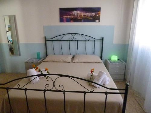 Ліжко або ліжка в номері Casa a 30 M dal mare