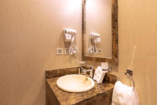 Ett badrum på Seiba Hotel Apartments-Riyadh