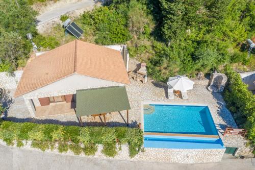 an overhead view of a house with a swimming pool at Kerithra Villa in Vasiliki