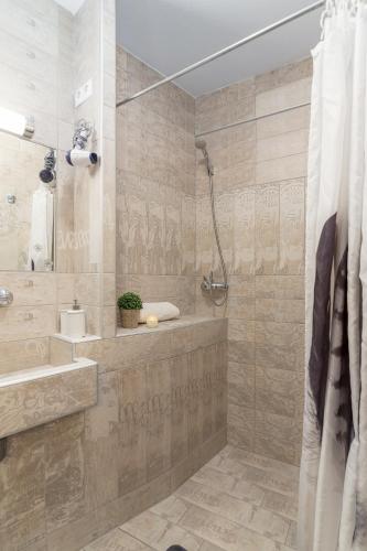 a bathroom with a shower and a sink at Apartma Bohinj in Bohinj