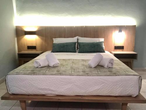 Ένα ή περισσότερα κρεβάτια σε δωμάτιο στο Poledas Apartments
