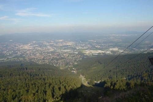 an aerial view of a city from a cable car at Pension Novy Den in Albrechtice