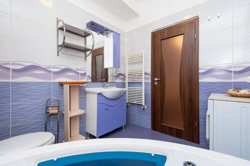 Ένα μπάνιο στο Relaxing Spa Apartment